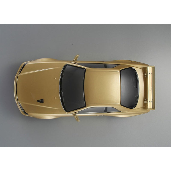 Killerbody Nissan Skyline R34 195mm RTU All-in 1/10 (Champaign-Gold)